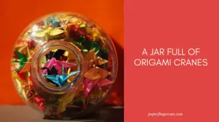 A Jar Full Of Origami Cranes